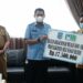 Bupati HSS Menyerahkan Bantuan PRS Melalui Dana CSR PDAM Dalam Program Rumah Sejahtera