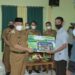 BUPATI HSS KEMBALI SALURKAN BANTUAN SOSIAL UNTUK KECAMATAN SIMPUR DAN KECAMATAN KALUMPANG