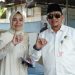 GUNAKAN HAK PILIHNYA, PJ BUPATI HSS BESERTA ISTRI IKUT MENCOBLOS DALAM PEMILU 2024 SERENTAK