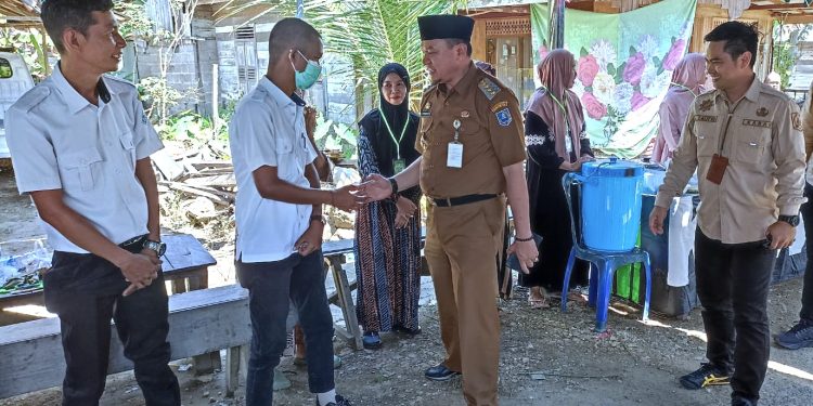 HADIRI SAPRAH AMAL DESA MANDALA, PJ. BUPATI BANYAK DISALAMI KERABAT